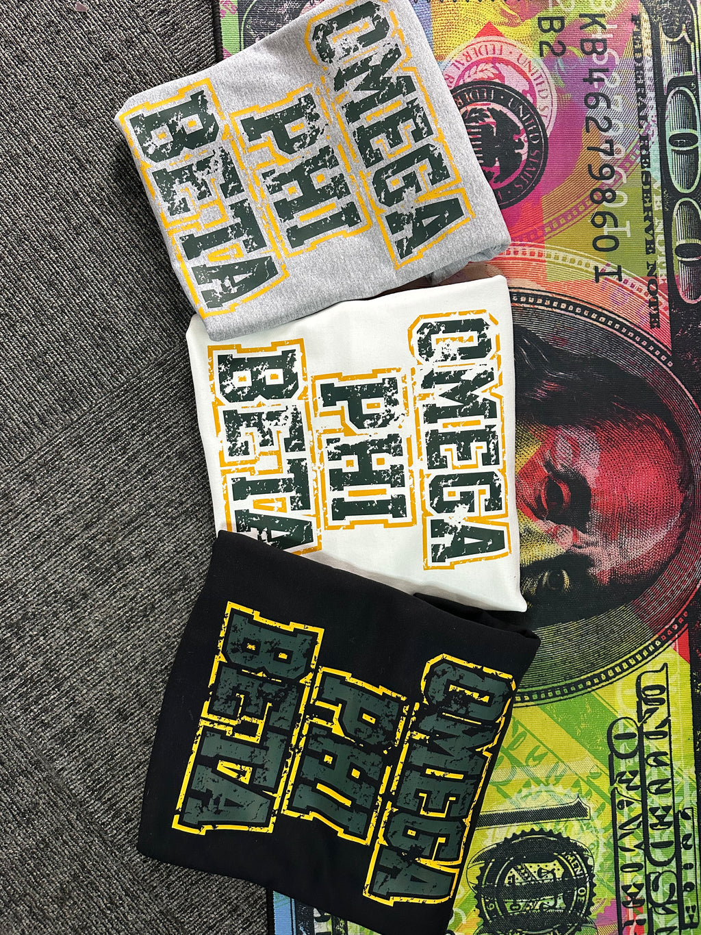 Omega Phi Beta - Distressed sweater.