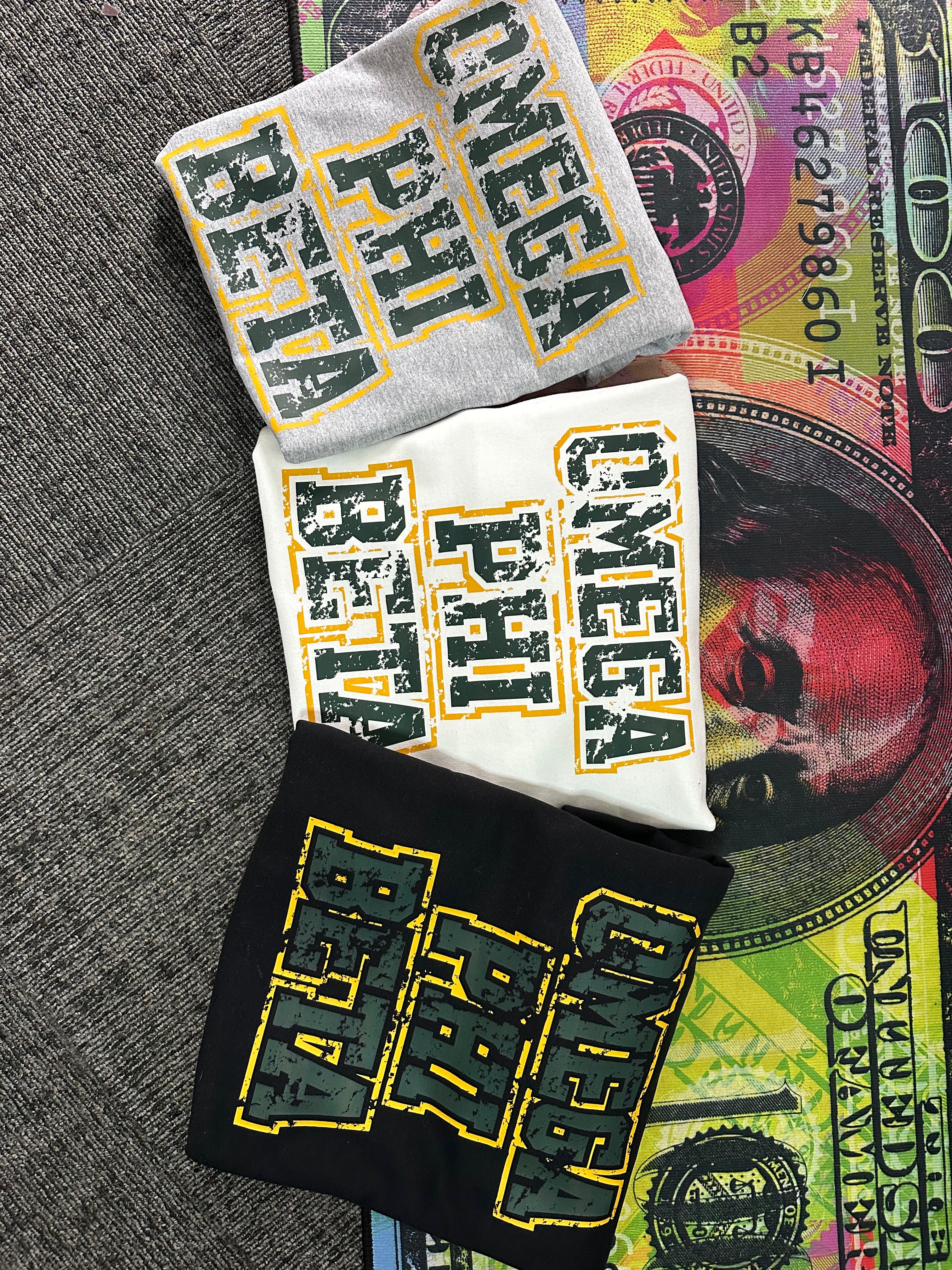Omega Phi Beta - Distressed sweater.