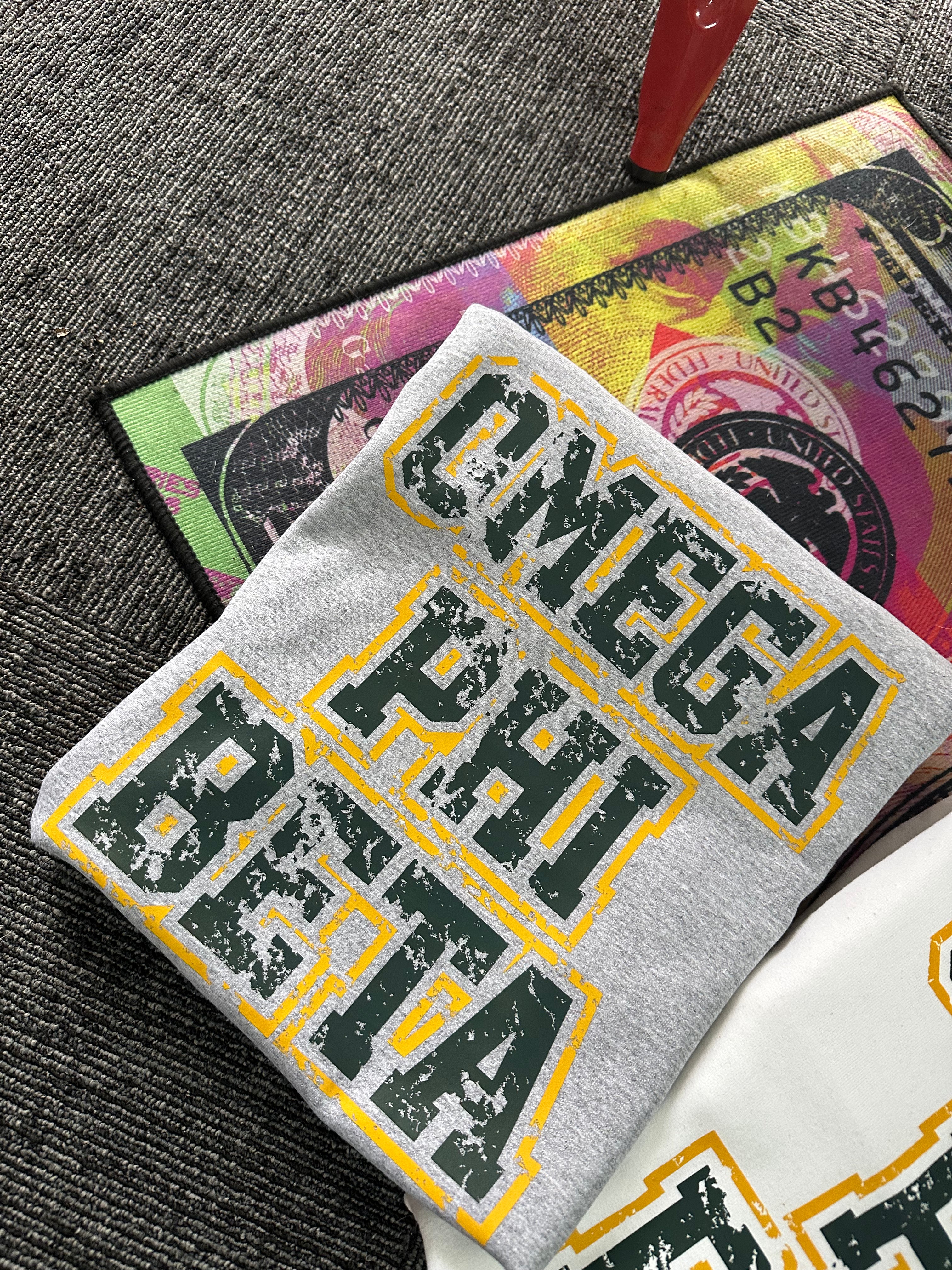 Omega Phi Beta - Distressed sweater.