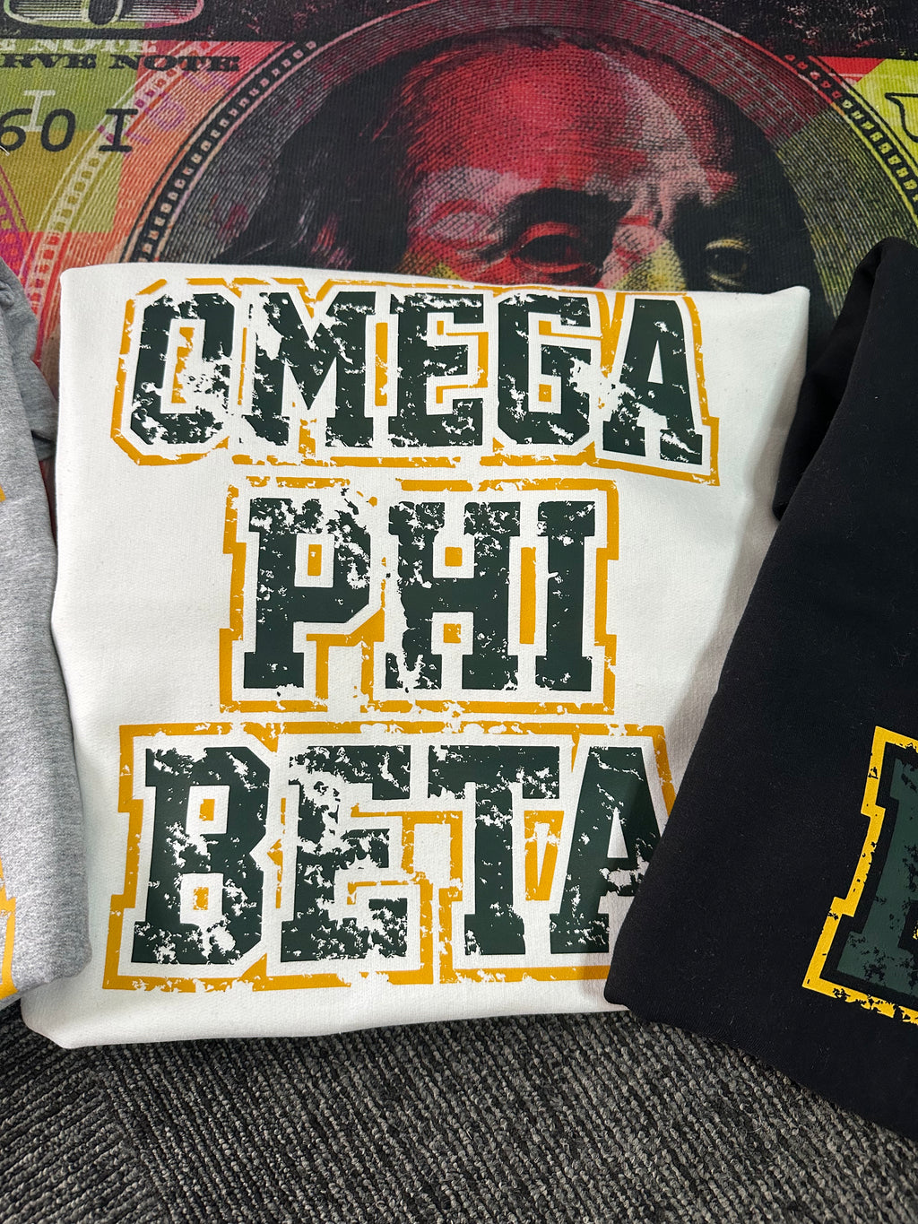 Omega Phi Beta - Distressed sweater.
