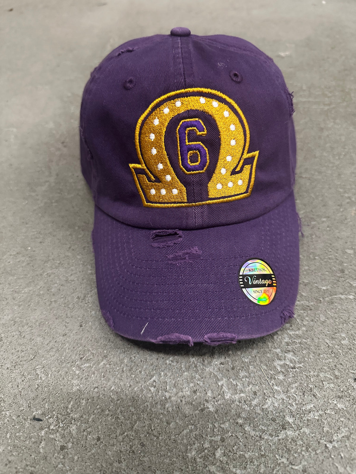 OMEGA PSI PHI DISTRESSED HAT