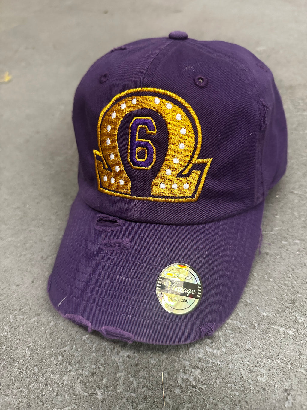 OMEGA PSI PHI DISTRESSED HAT
