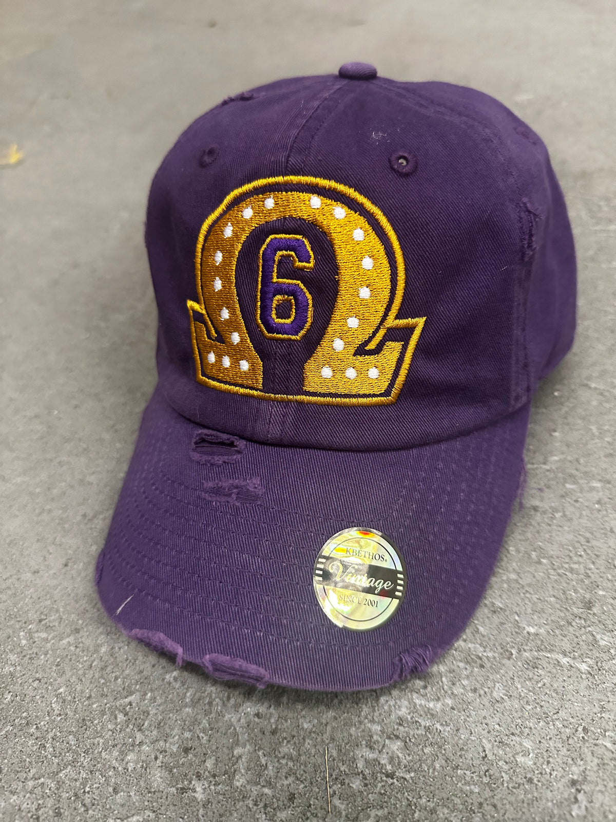 OMEGA PSI PHI DISTRESSED HAT